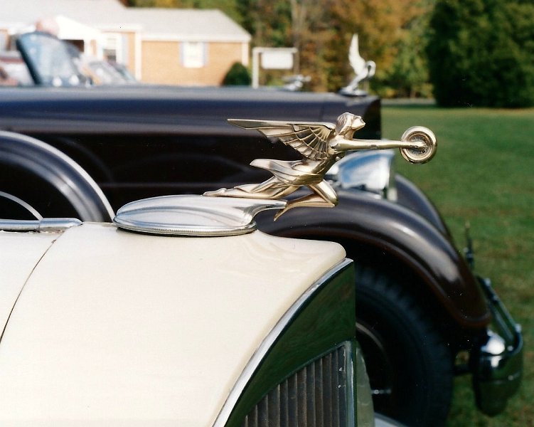SCAN1161-001.JPG - Goddess of Speed and Cormorant hood ornaments