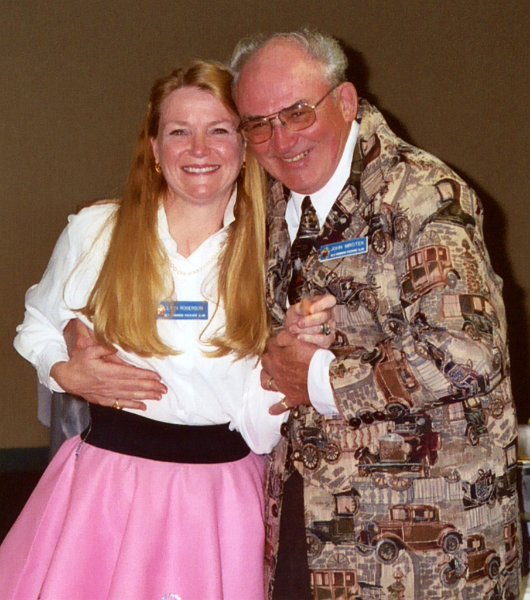 img359-001.JPG - Lynn Rogerson presents a Preservation chip to John Mrotek