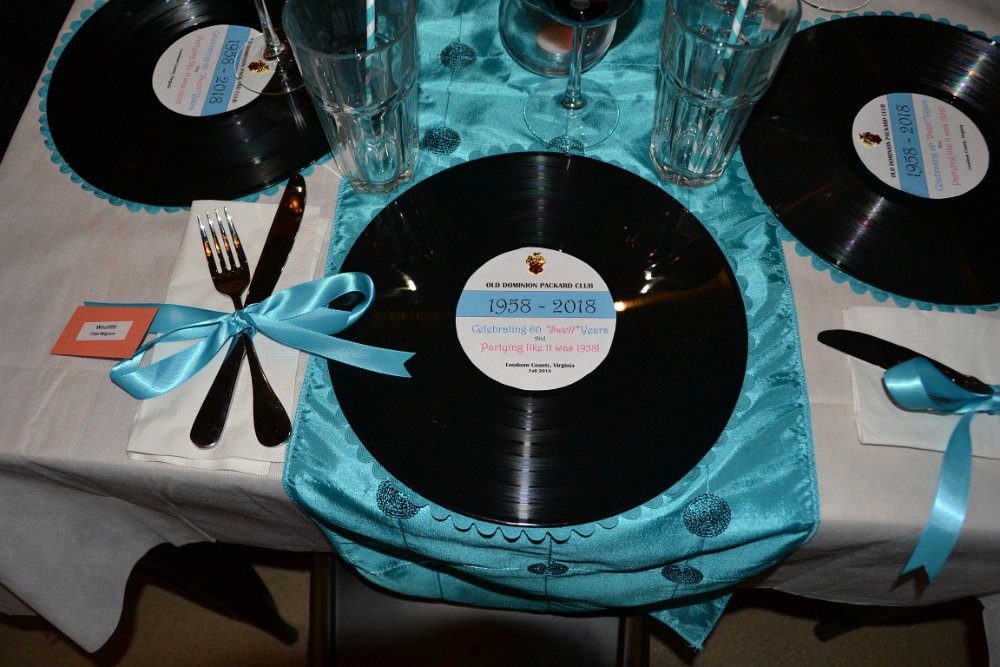 DSC_0192-001.JPG - Our custom charger "plates", made from old LPs and embellished.