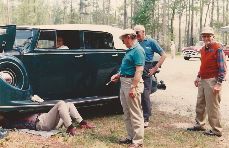 SCAN0396-002.JPG - Get out and get under!  That's Harold Coldren on the ground, Roy Hummer in the car, Stan Eckenroth, Bob Sommers and Ira Plasterer offering advice and a wrench.