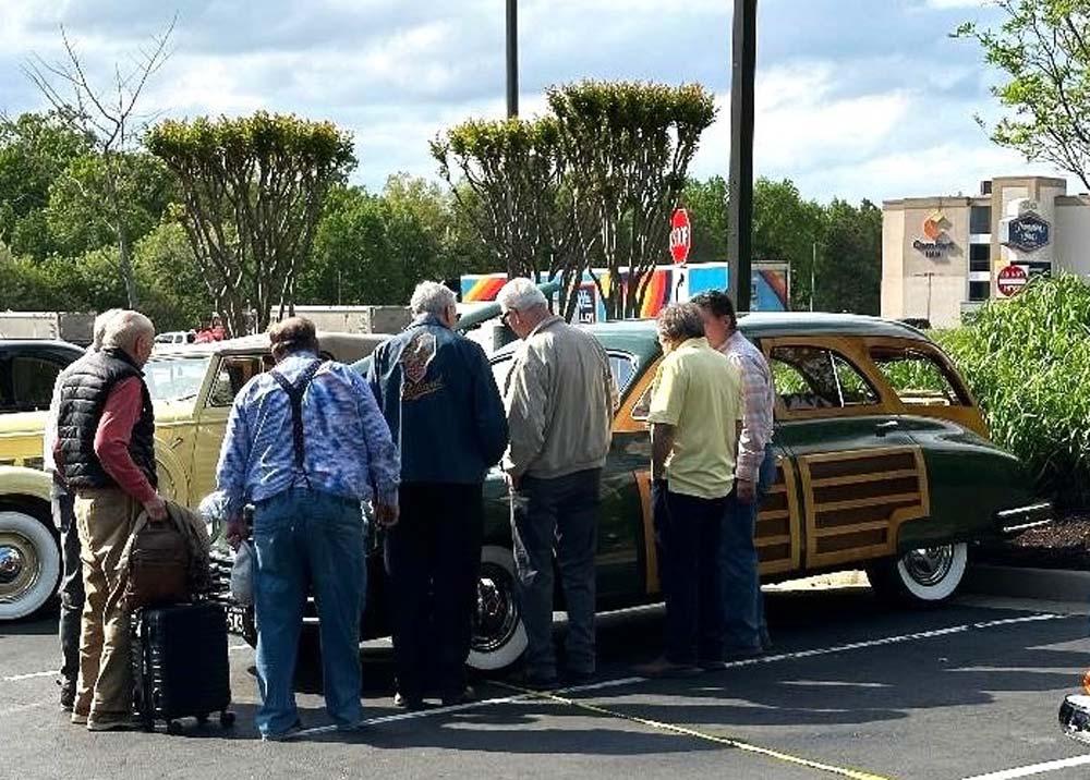 01.jpg - ODPC members crowd around the Hatfields’ “new” 1948 Station Sedan.
