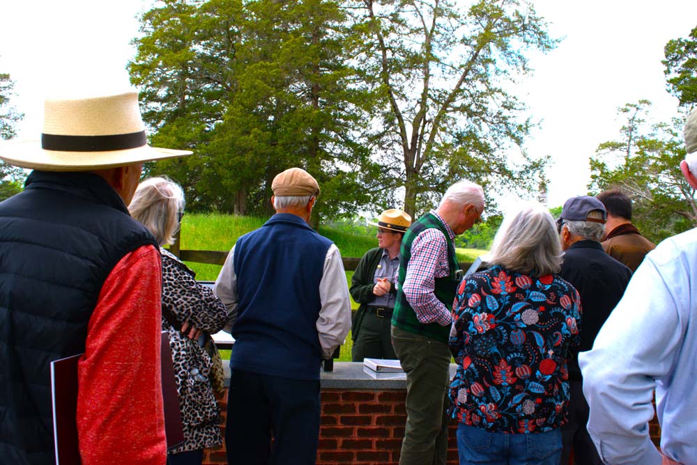 15.jpg - Members listen to the Ranger discussing the details of the Crater.