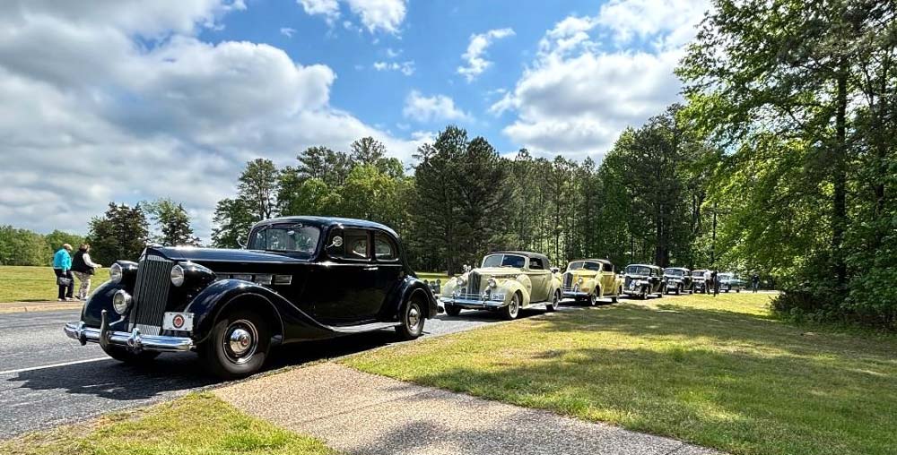 22.jpg - Gunther Hoyt’s 1937 coupe, followed by Richard Obenschain’s 1940 Super Eight convertible, and other cars.